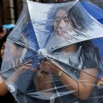 Chuva forte atinge Pequim durante passagem do tufão Dolphin